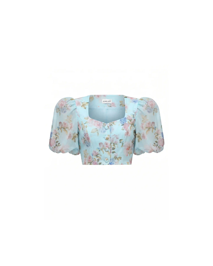 Chanelle, top in blue chiffon with a floral print
