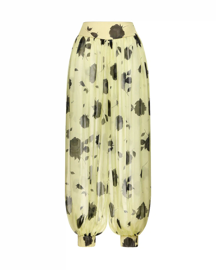 Evie, trousers made of yellow chiffon with gray flowers