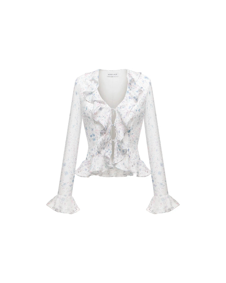 Ruzana, milky chiffon blouse with sleeves and ruffles featuring a floral print