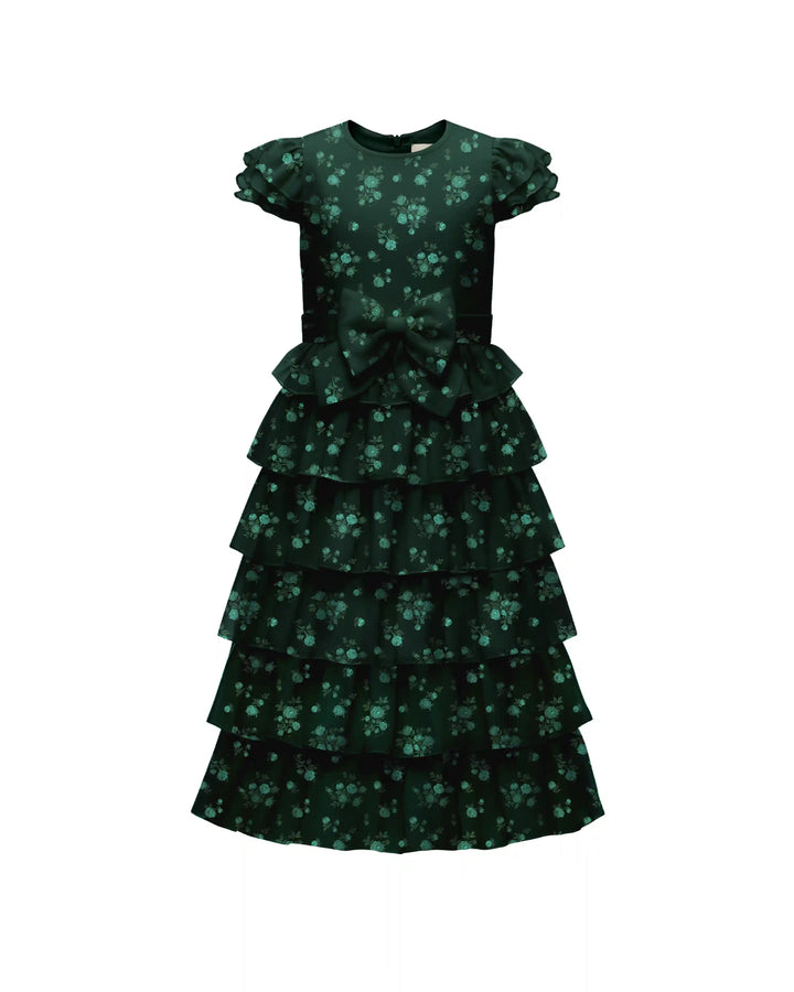Ava, children’s dress made of dark green crepe de chine with a floral print