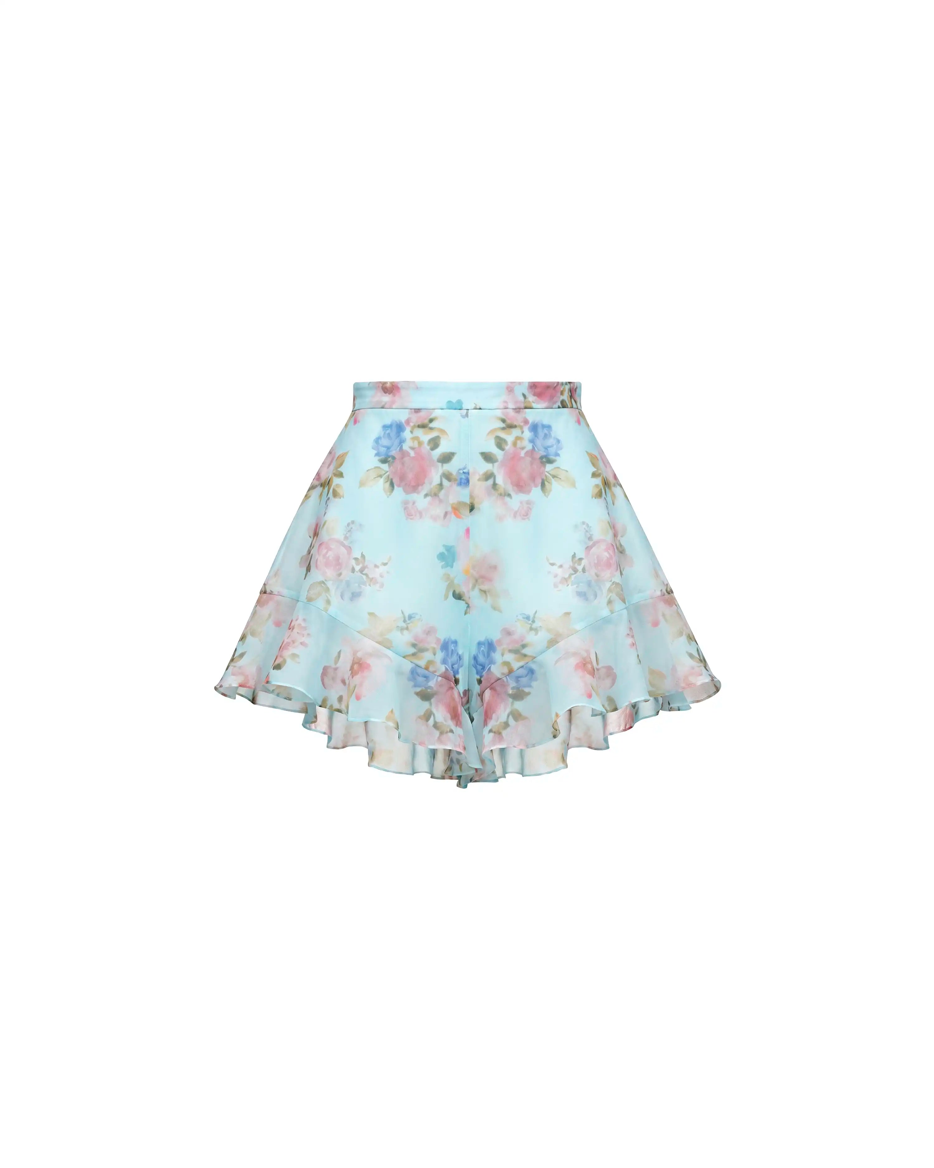 Audrie, shorts with ruffles in blue chiffon with a floral print