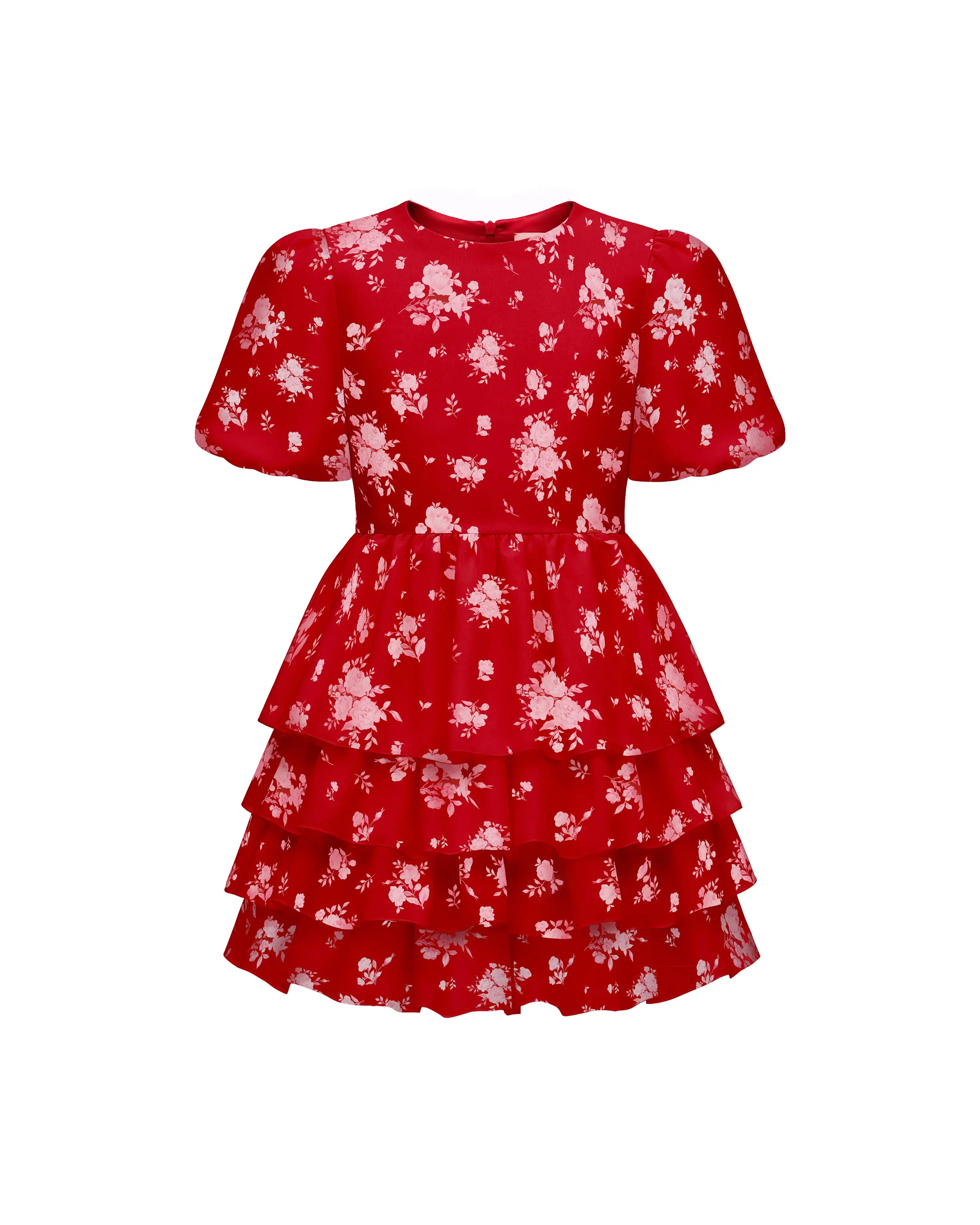 Fifi, children’s dress in red crepe de chine with a floral print