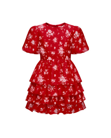 Fifi, children’s dress in red crepe de chine with a floral print