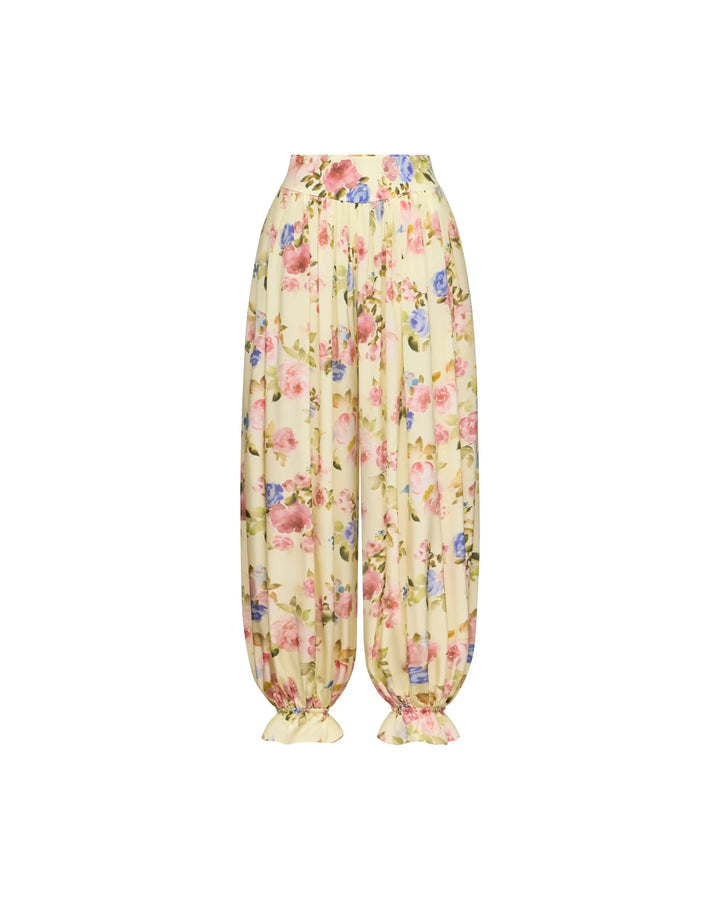 Evie frill, trousers in pale yellow crepe de chine with a floral print