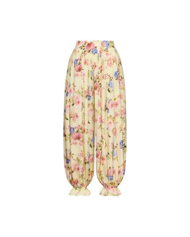 Evie frill, trousers in pale yellow crepe de chine with a floral print
