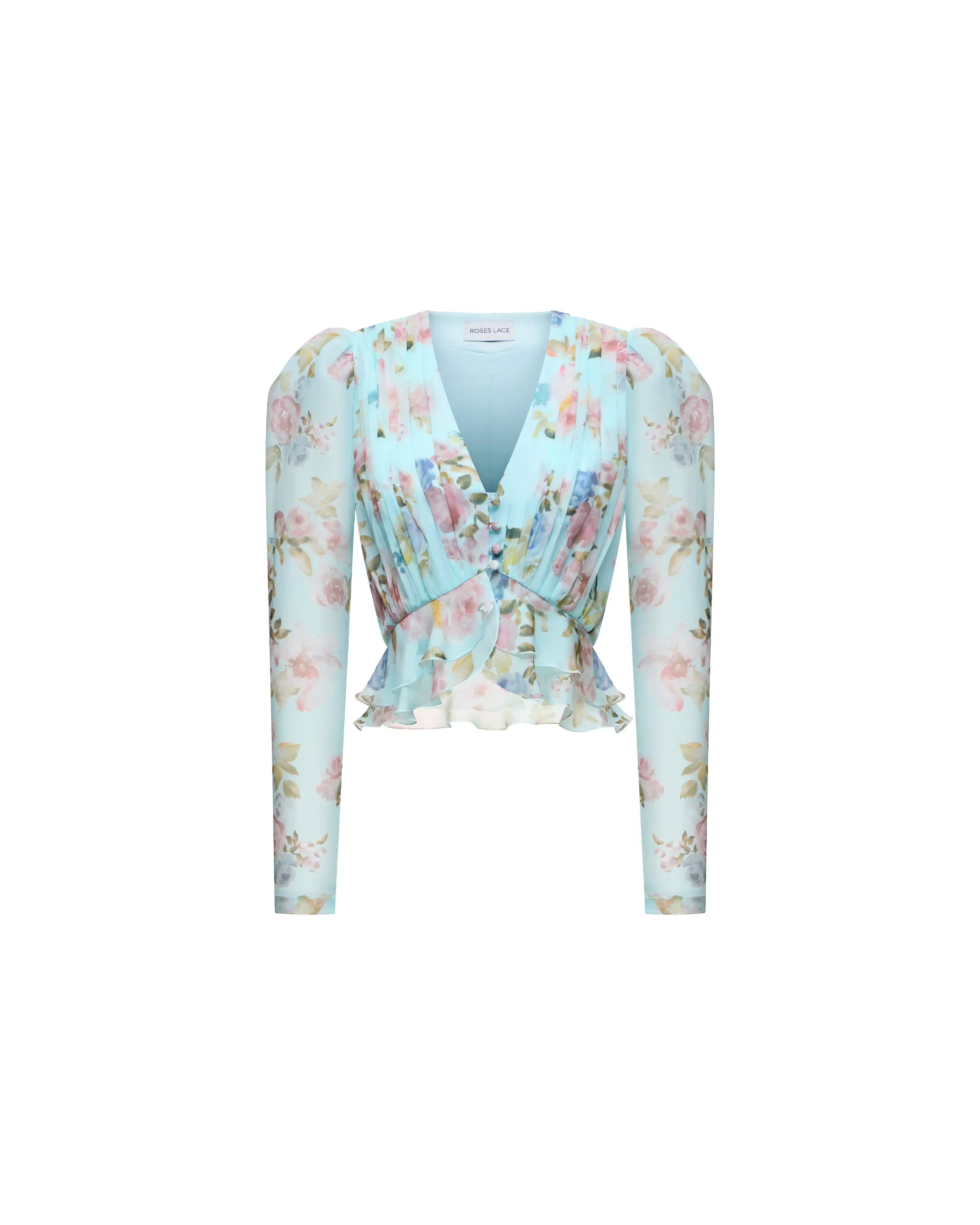 Carolina, a blouse in blue chiffon with a floral print