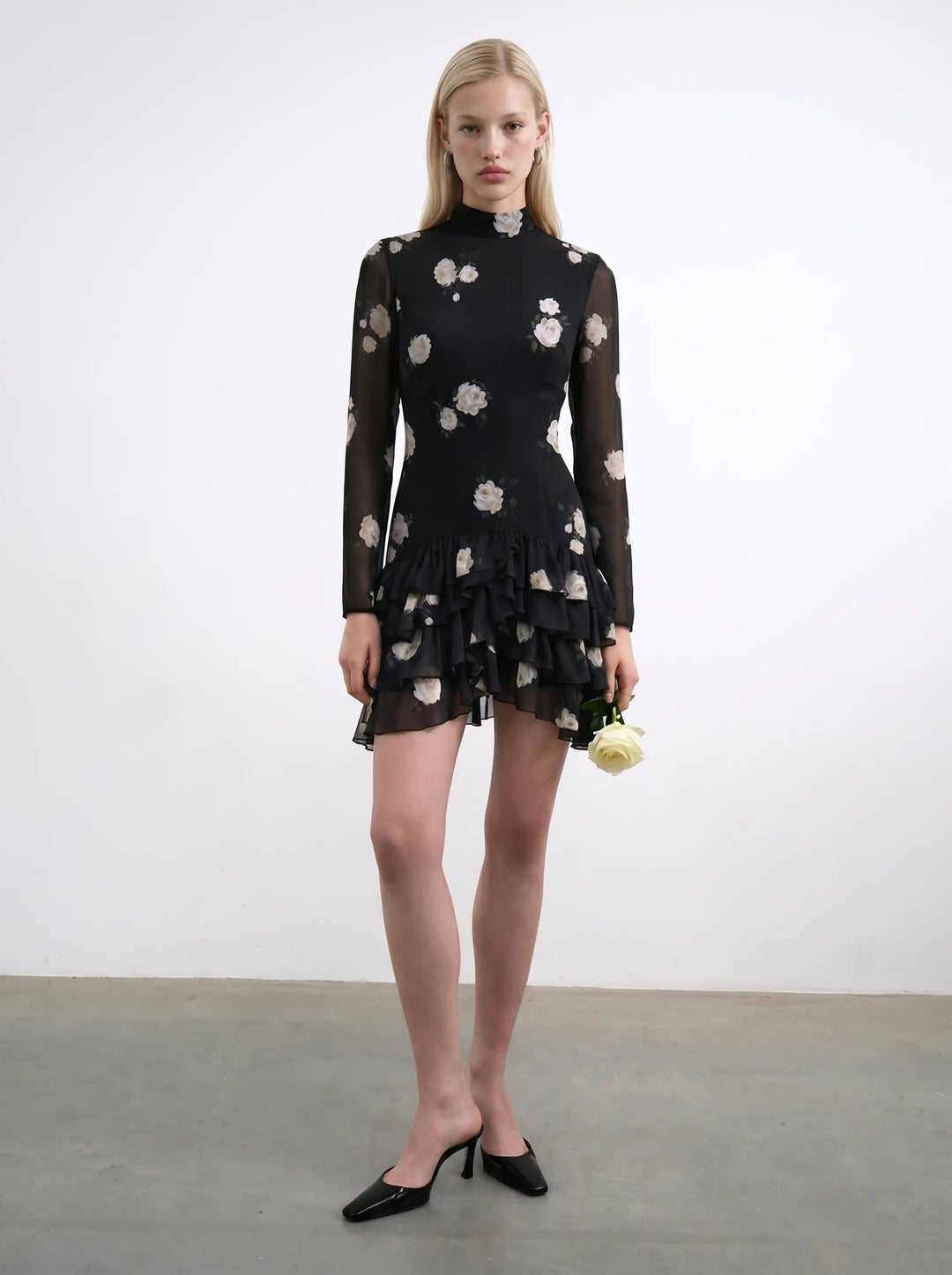 Stella mini, mini dress in black chiffon with a floral print