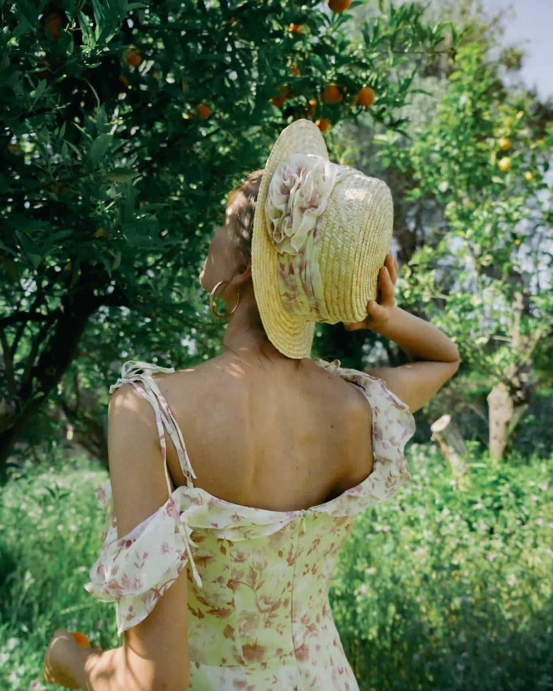 Malena Spiral, wide-brimmed women’s hat with a ribbon and a rose