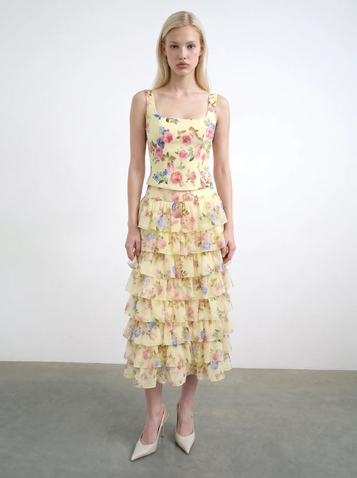 Vi, corset top with straps made of pale yellow crepe de chine with a floral print
