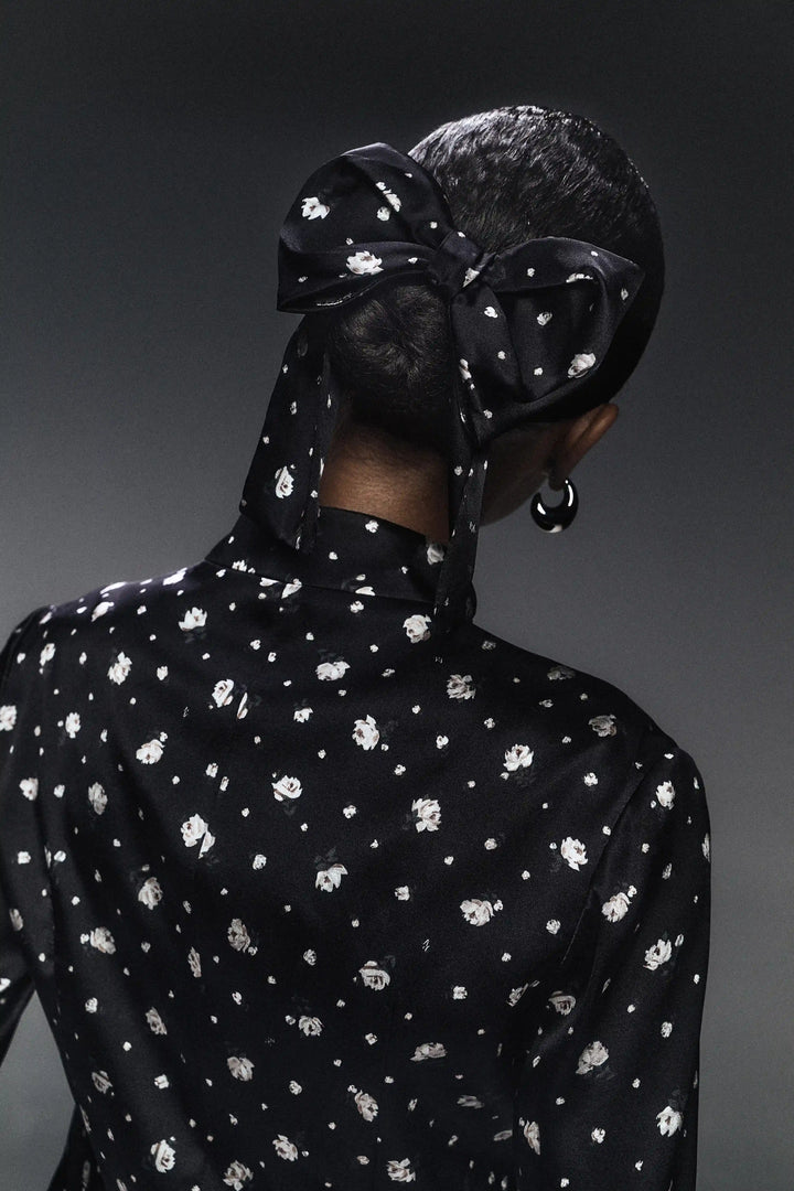 Mirella, hair bow made of black satin with small floral print