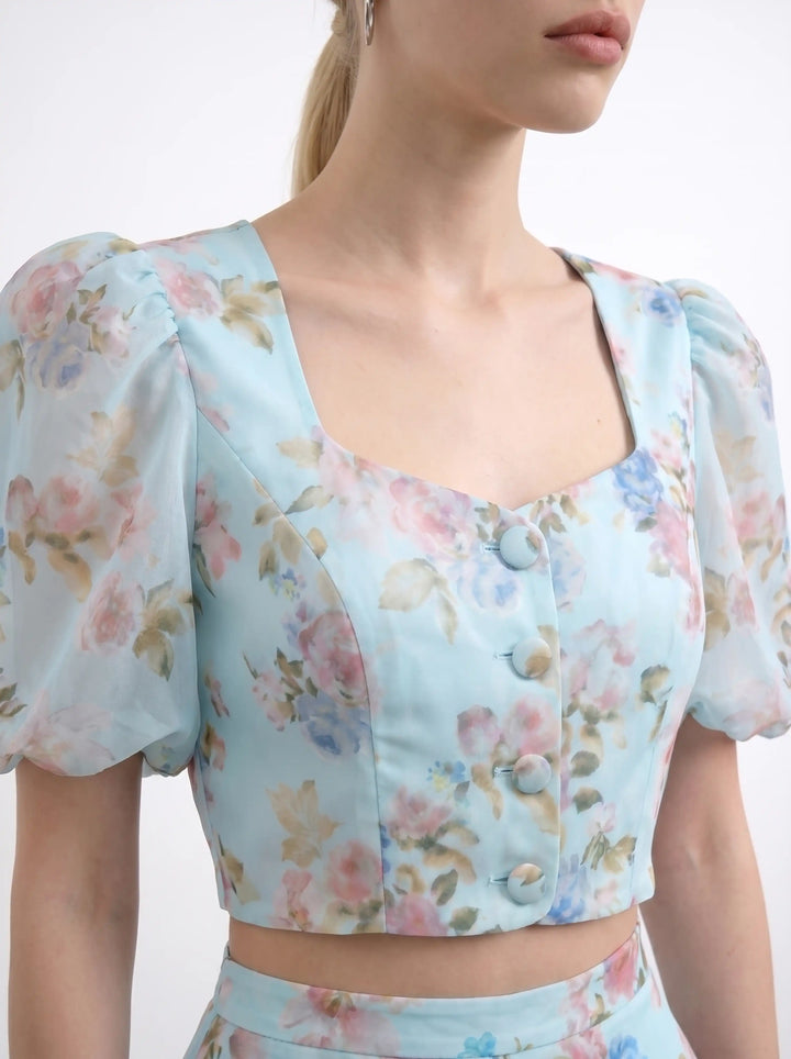 Chanelle, top in blue chiffon with a floral print