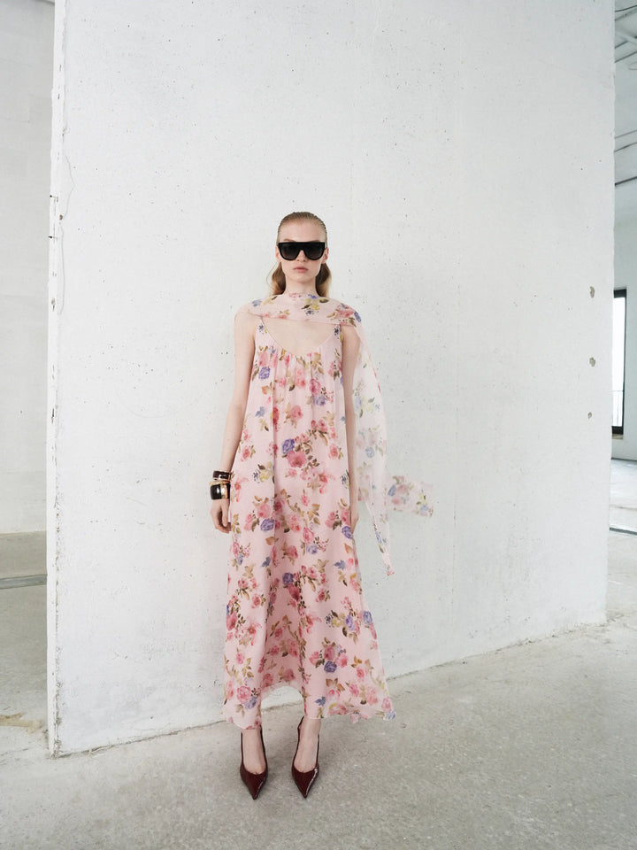 Karine maxi, strappy maxi dress in light pink chiffon with a floral print