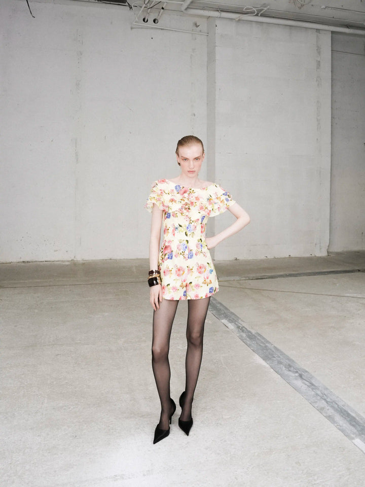 Abby, jumpsuit in pale yellow batiste with a floral print