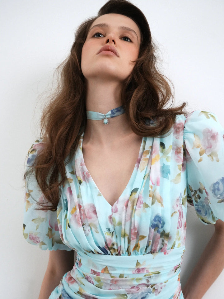 Arin, blue chiffon choker with a floral print and pendant detail