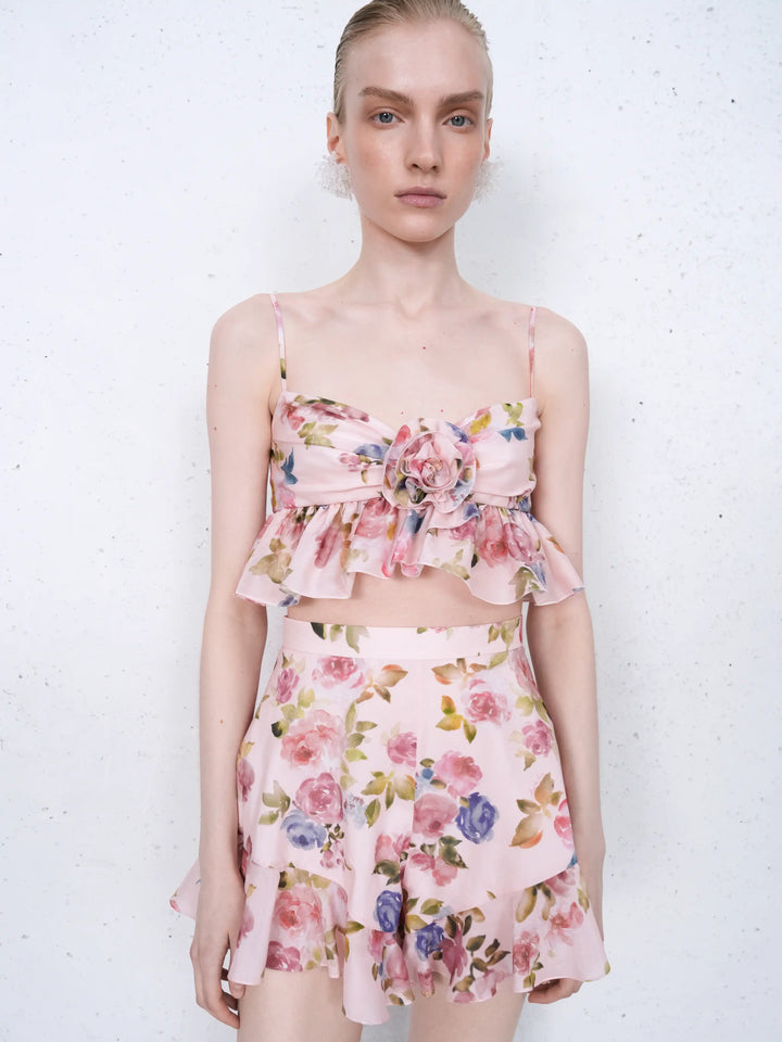 Audrie, shorts with ruffles in light pink batiste with a floral print