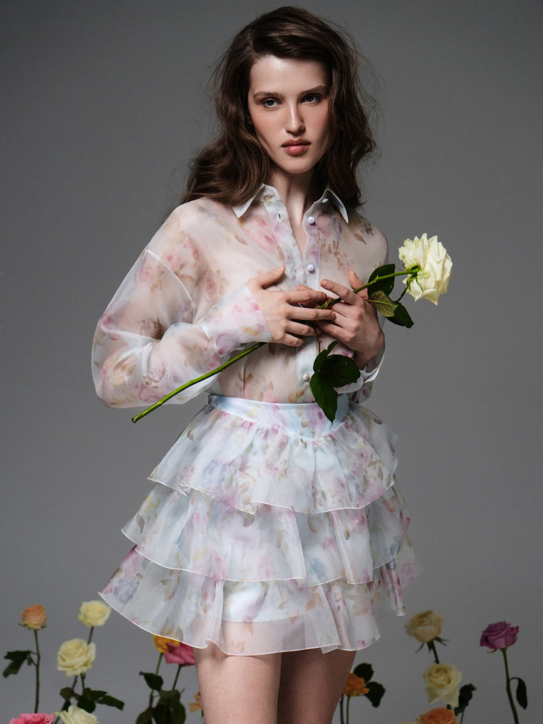 Harper, blue organza blouse with a floral print