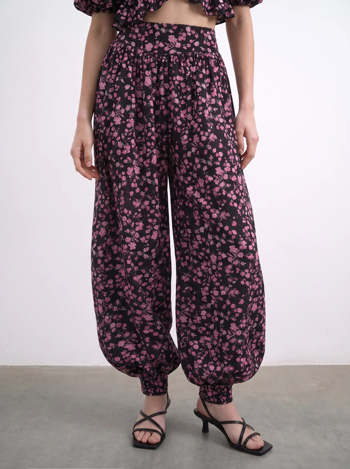 Evie, black batiste pants with small light pink flowers