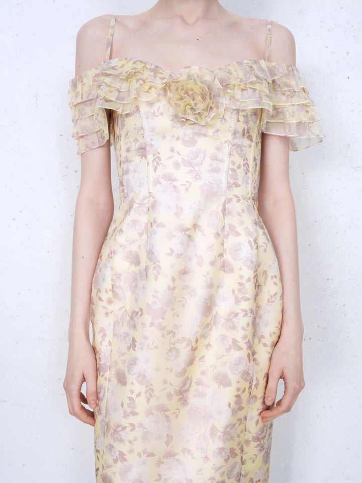 May midi, midi dress in yellow organza with a floral print, ruffles, and a rose detail