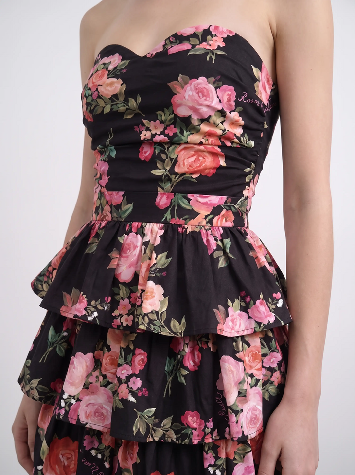 Irma mini, mini dress in black batiste with medium pink flowers