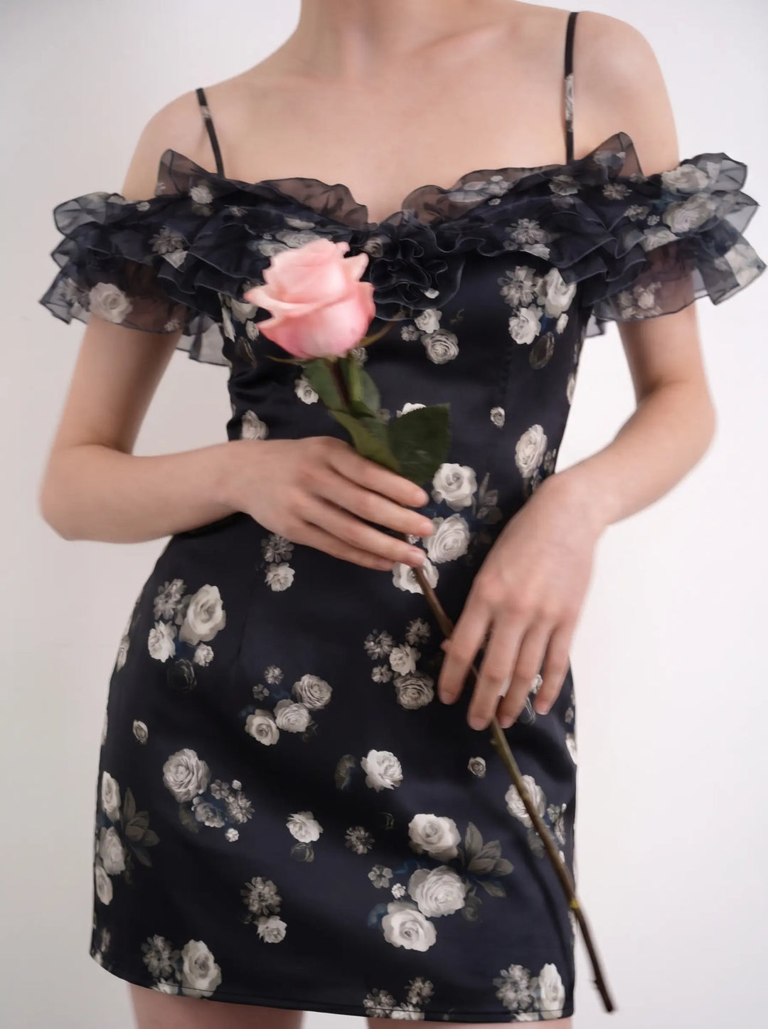 May mini, mini dress in black organza with a floral print