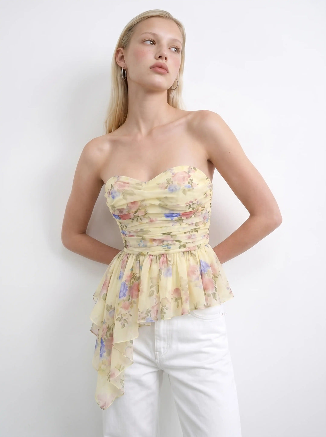 Joan, corset top in pale yellow crepe de chine with a floral print