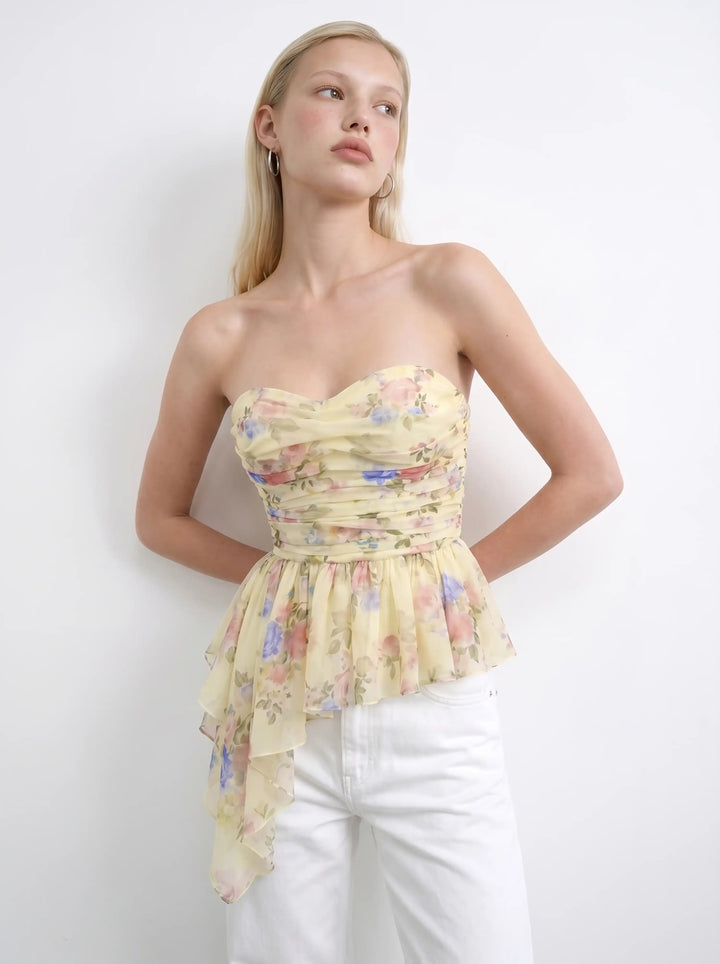 Joan, corset top in pale yellow crepe de chine with a floral print
