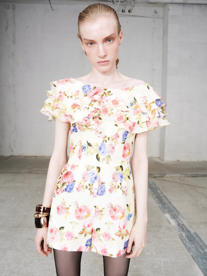 Abby, jumpsuit in pale yellow batiste with a floral print
