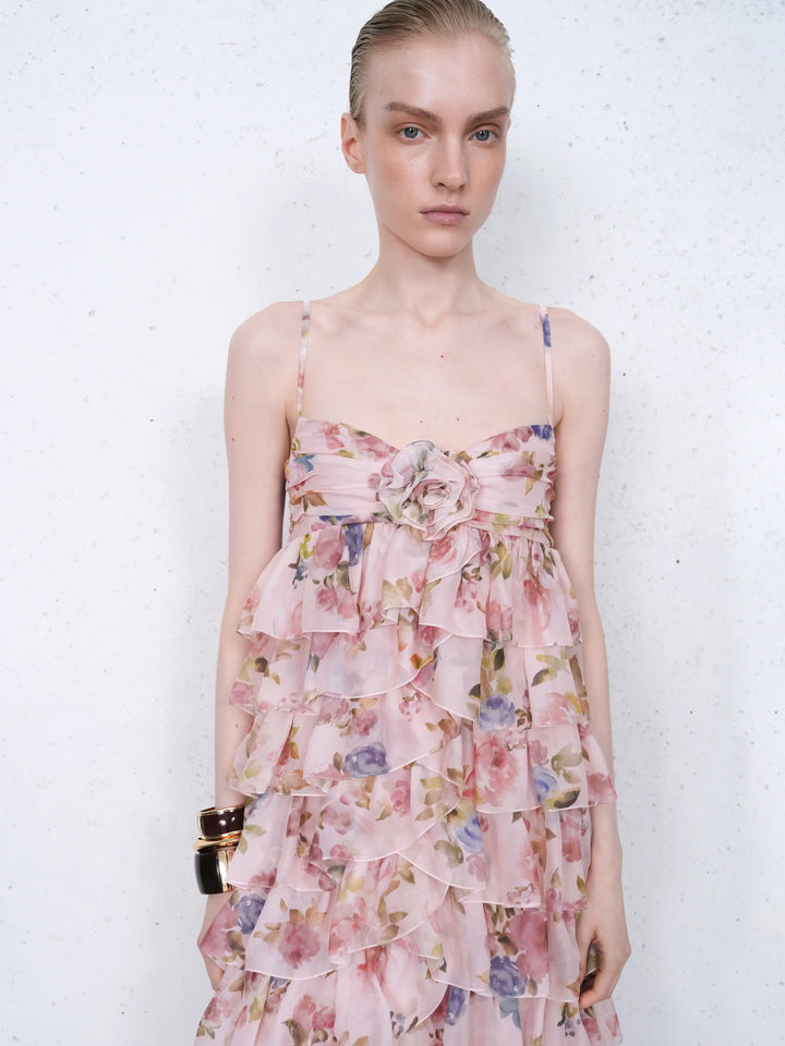 Willow maxi, maxi dress in pink chiffon with a floral print and a rose detail
