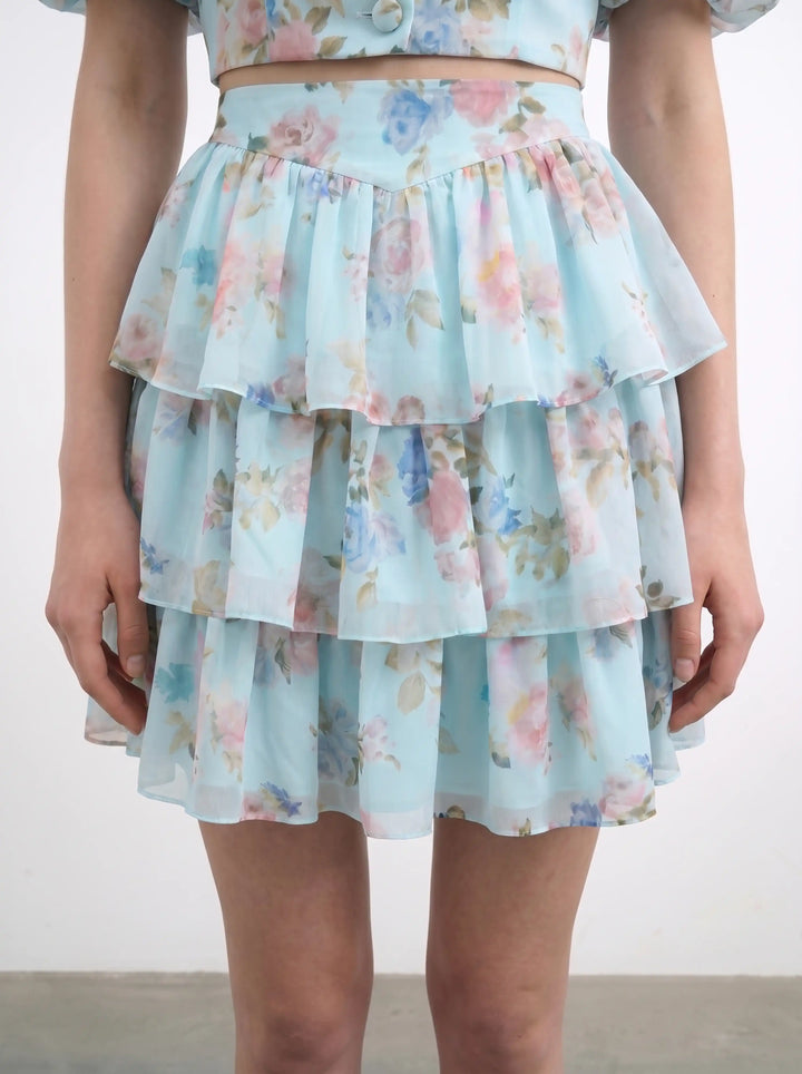 Betty mini, mini skirt in blue chiffon with a floral print