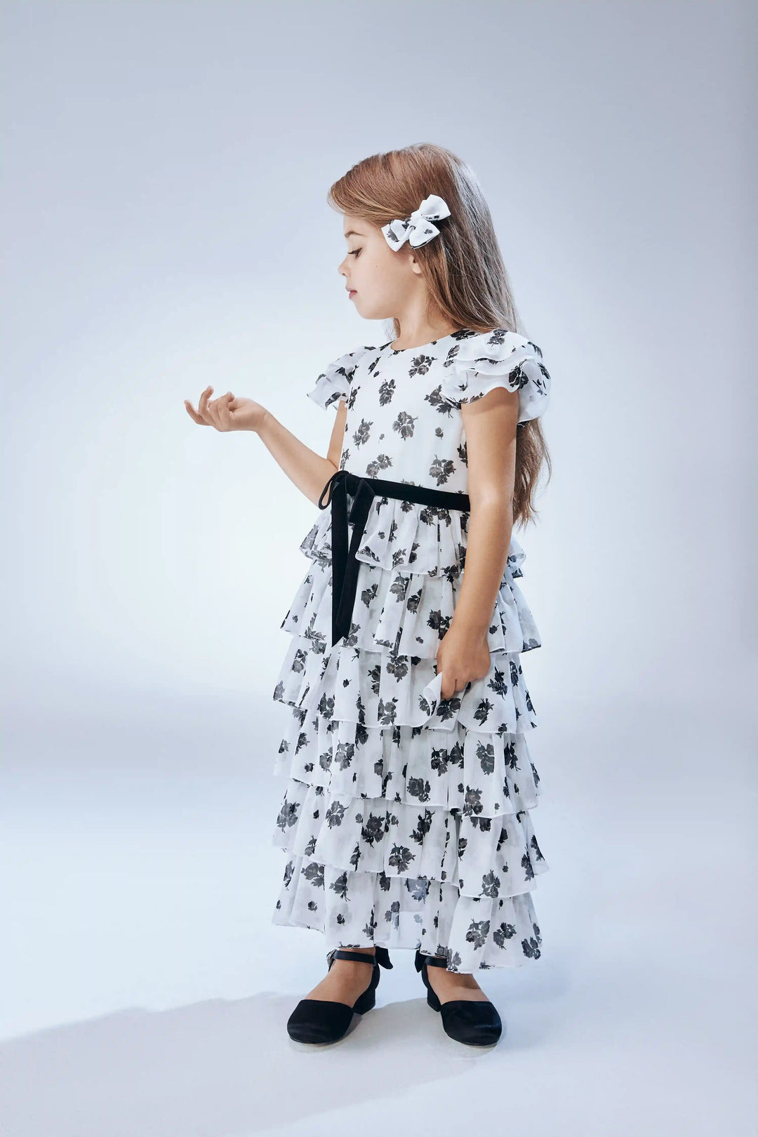 Ava, children's dress made of ivory chiffon with floral print, with a bow