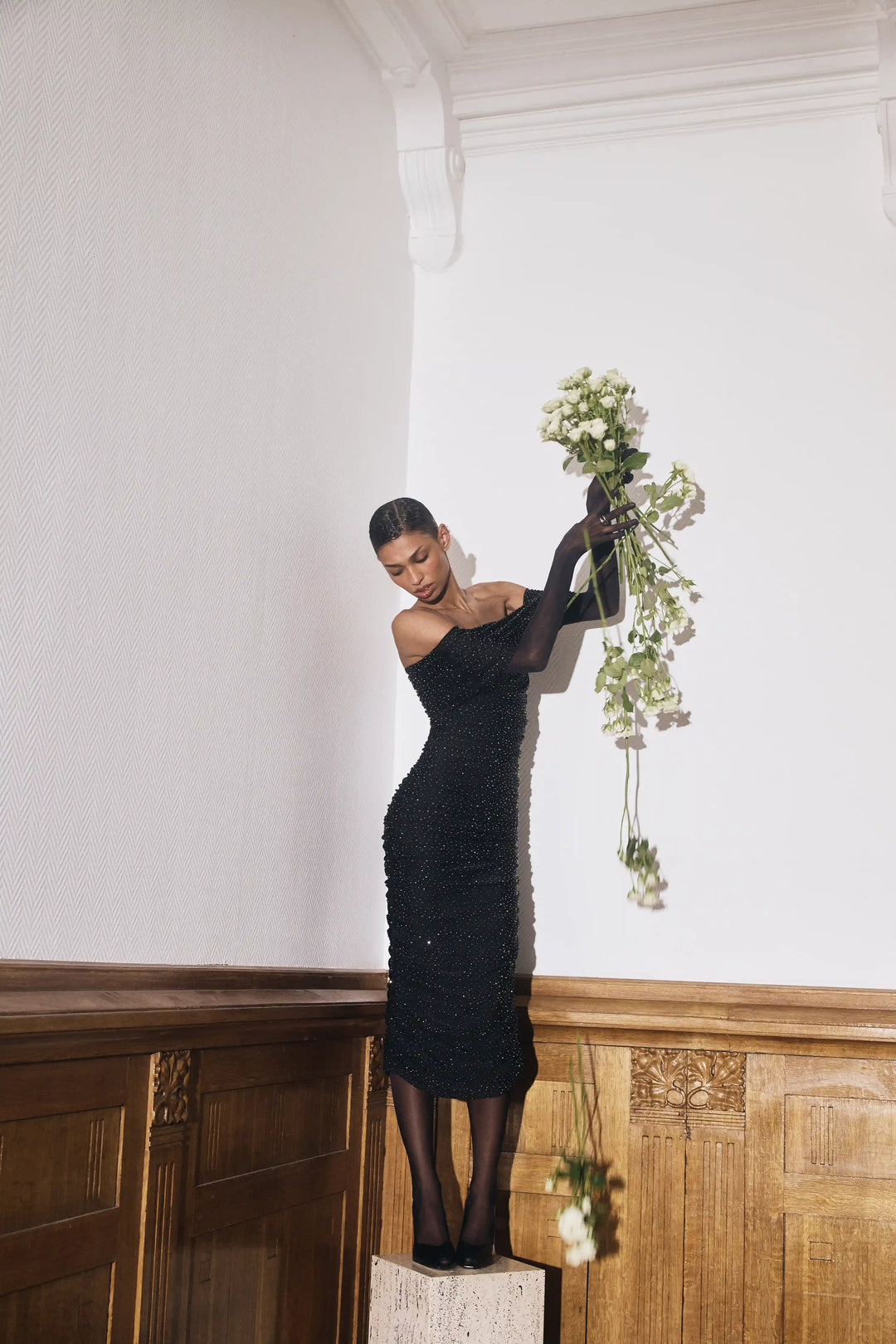 Iren midi, draped midi dress made of black biflex with rhrinestones