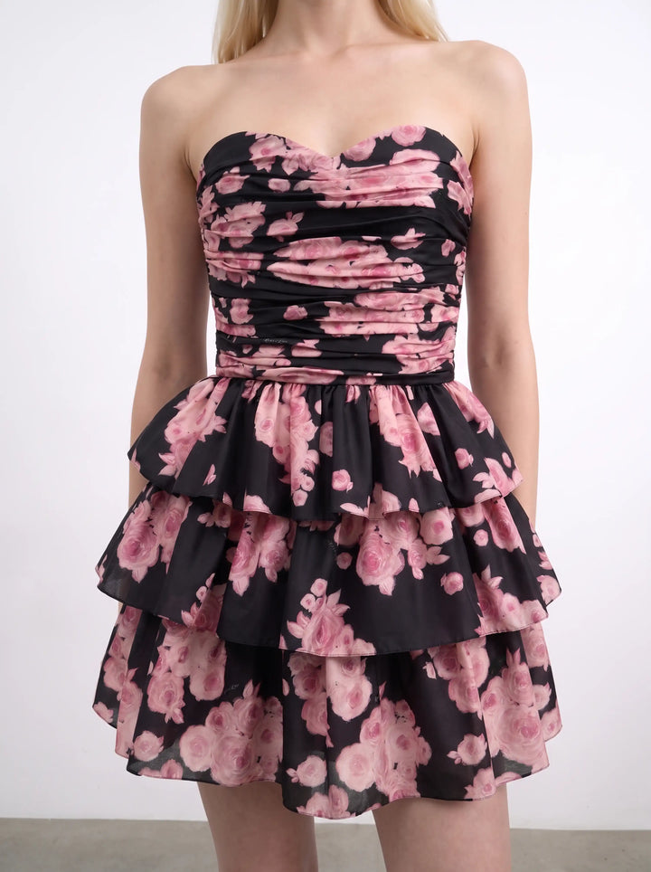 Irma mini, mini dress in black batiste with medium pink flowers