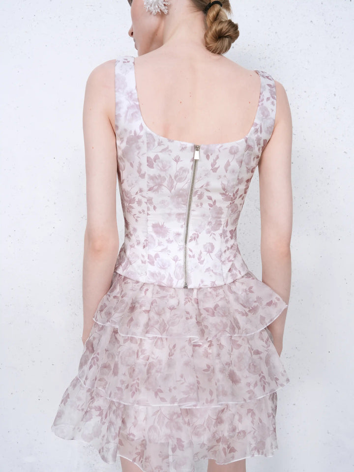 Vi, corset top in milky organza with a floral print