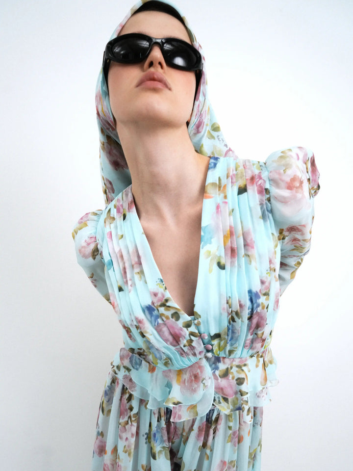 Carolina, blue chiffon blouse with a floral print