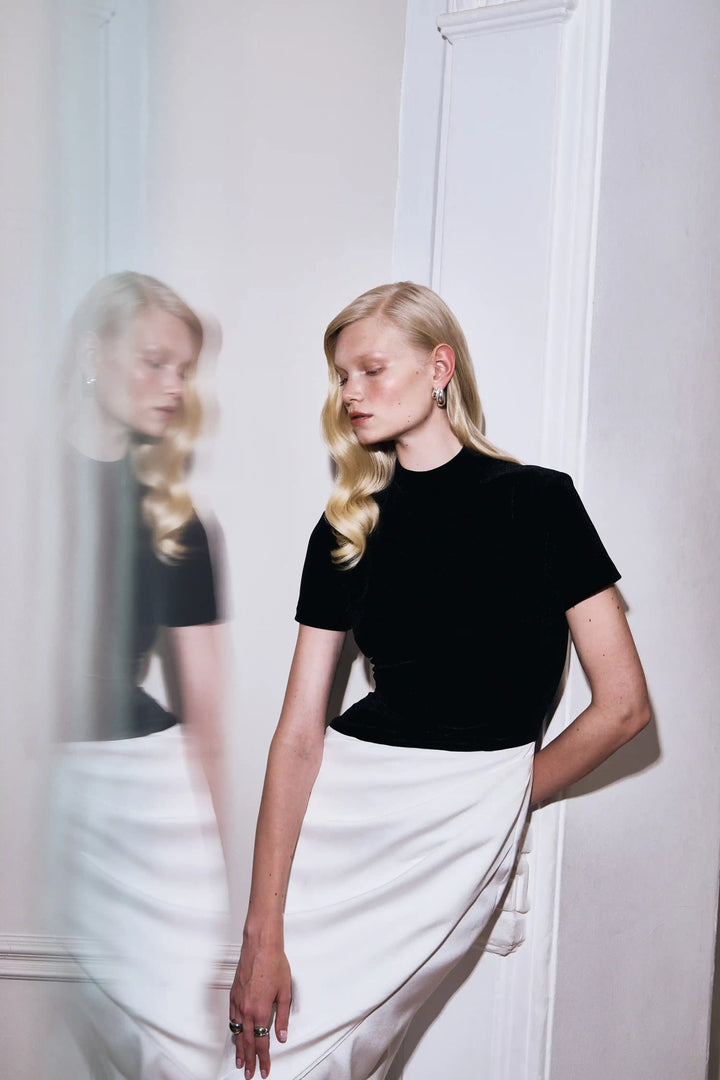 Celine, midi dress with a top made of black velvet and a skirt of ivory satin