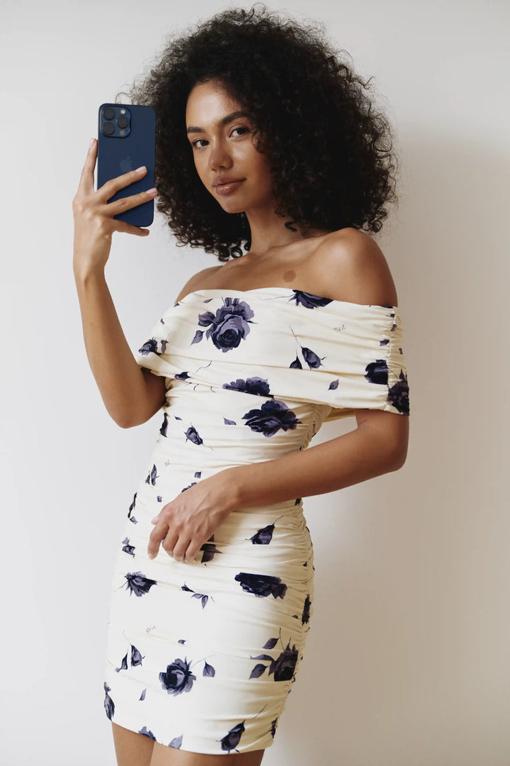 Iren mini, midi dress made of yellow biflex with gray flowers