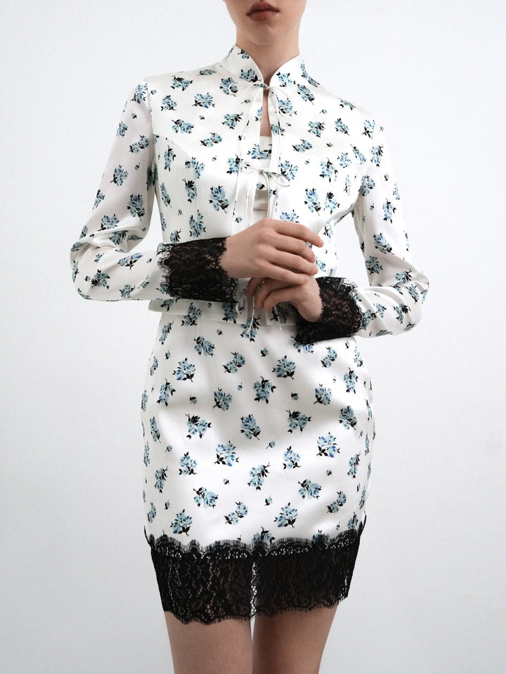 Chona, milky satin jacket with a floral print and black lace trim