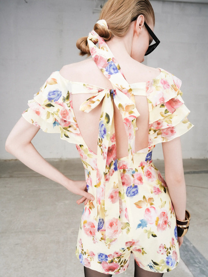 Abby, jumpsuit in pale yellow batiste with a floral print