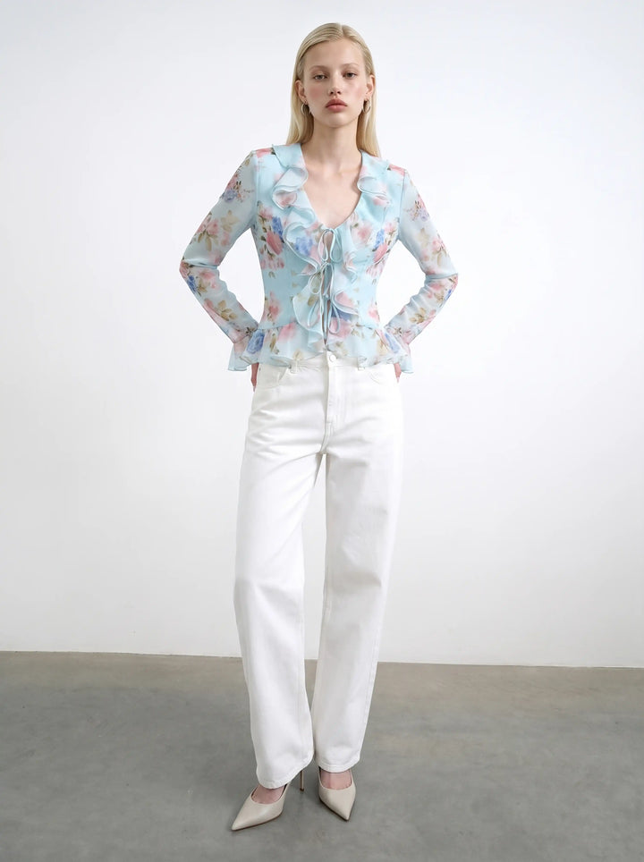 Ruzana, blouse with sleeves and ruffles in blue chiffon with a floral print