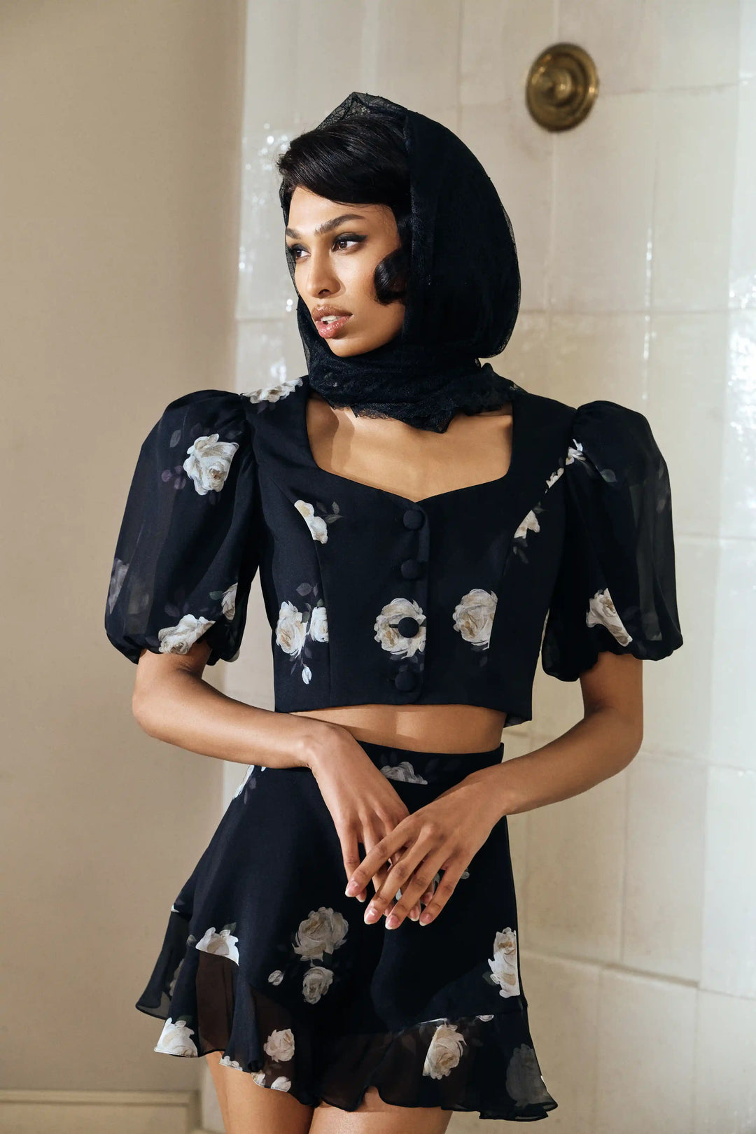 Chanelle, top made of black chiffon with a floral print