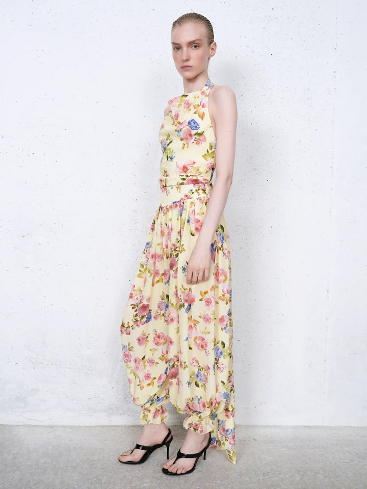 Evie frill, trousers in pale yellow crepe de chine with a floral print