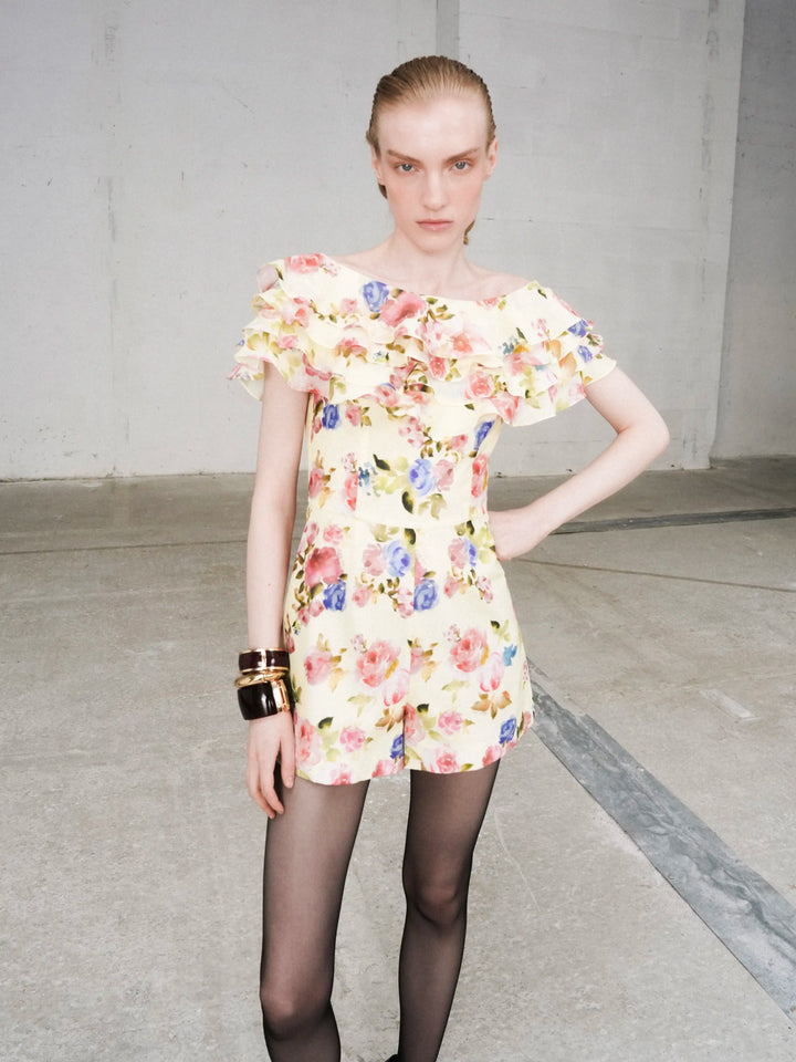 Abby, jumpsuit in pale yellow batiste with a floral print