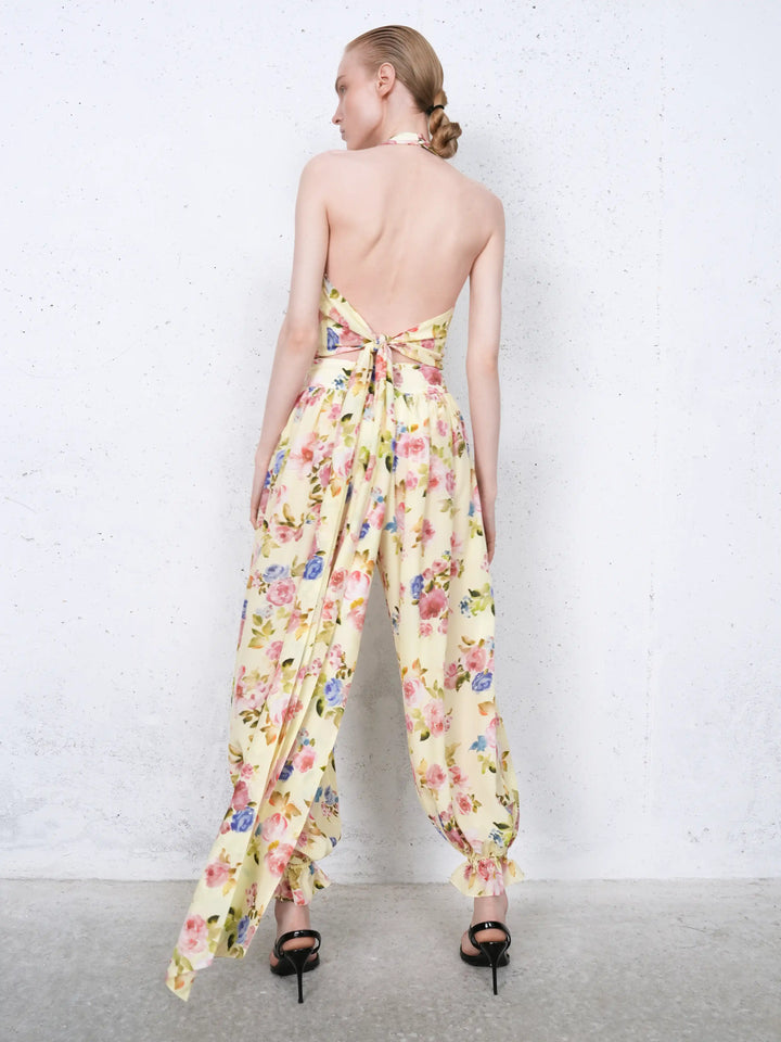 Evie frill, trousers in pale yellow crepe de chine with a floral print