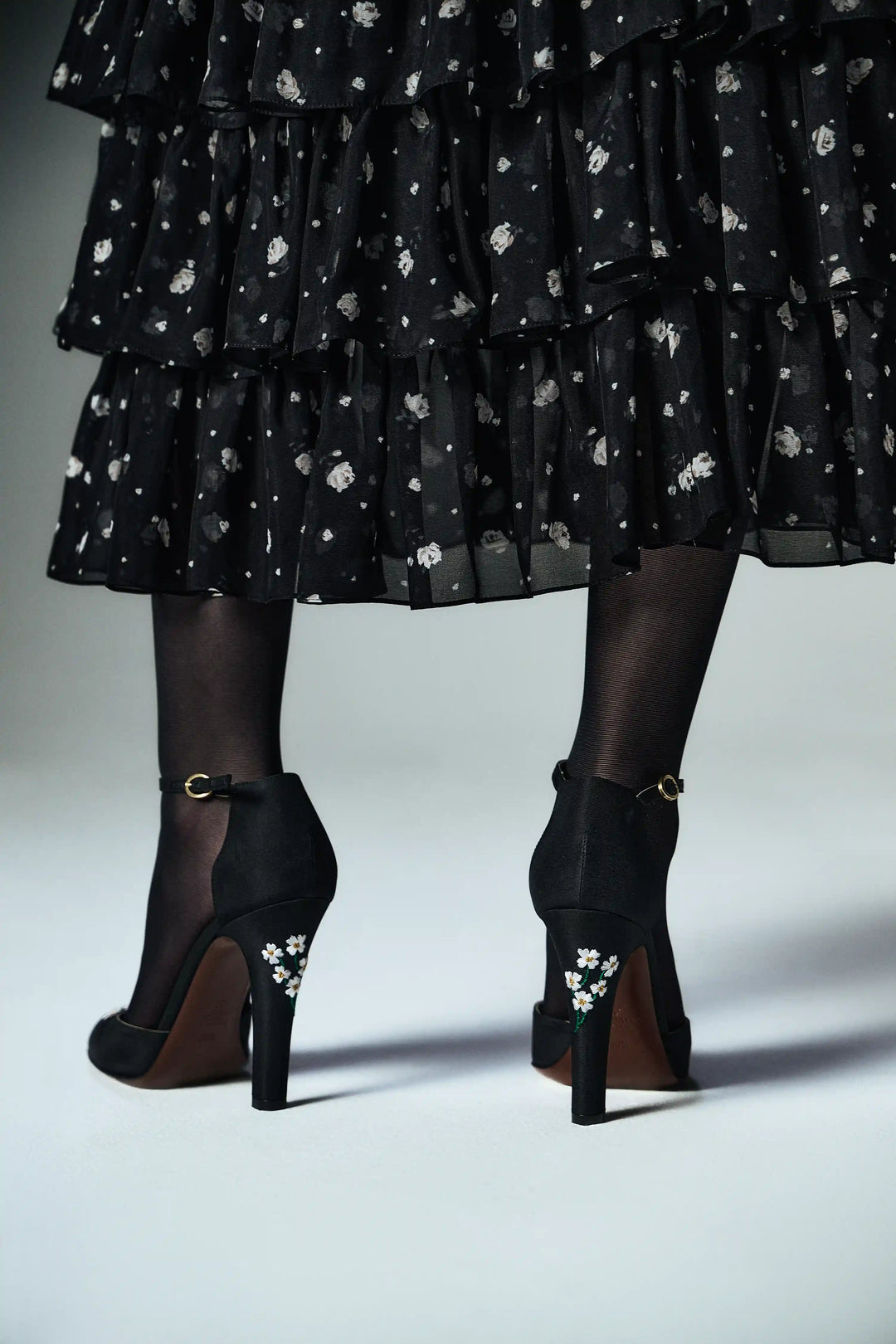 Lisen, corset midi dress made of black velvet and chiffon with small floral print