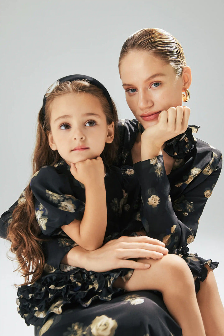 Fifi frill, children's dress made of black crepe de chine with floral print