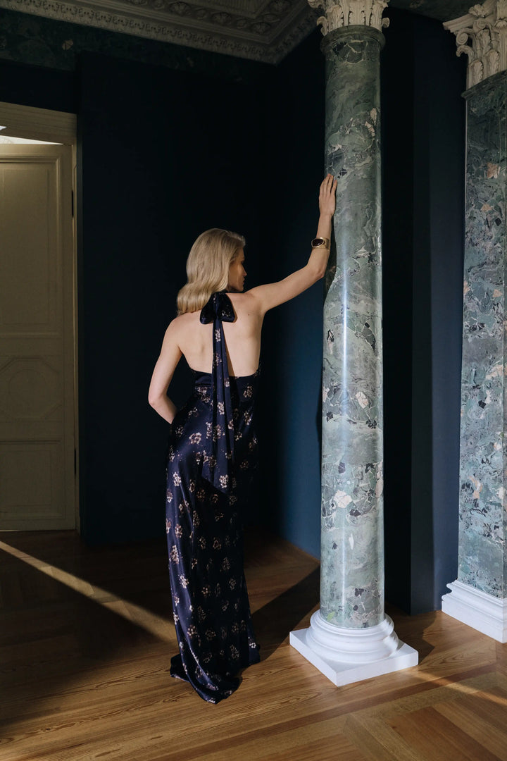 Alia maxi, a black satin maxi dress with a medium-scale floral print