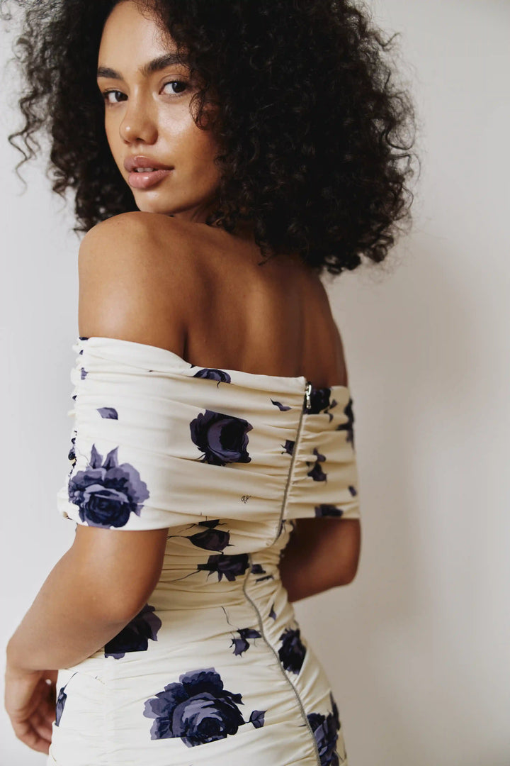 Iren mini, midi dress made of yellow biflex with gray flowers