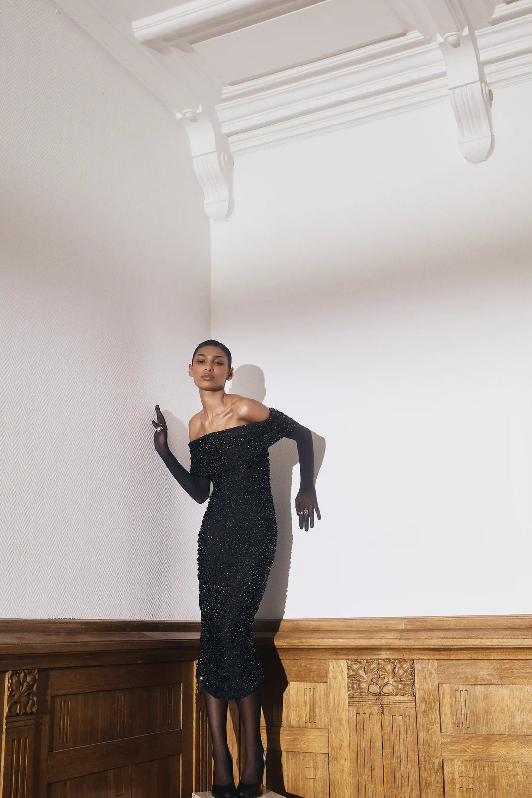 Iren midi, draped midi dress made of black biflex with rhrinestones