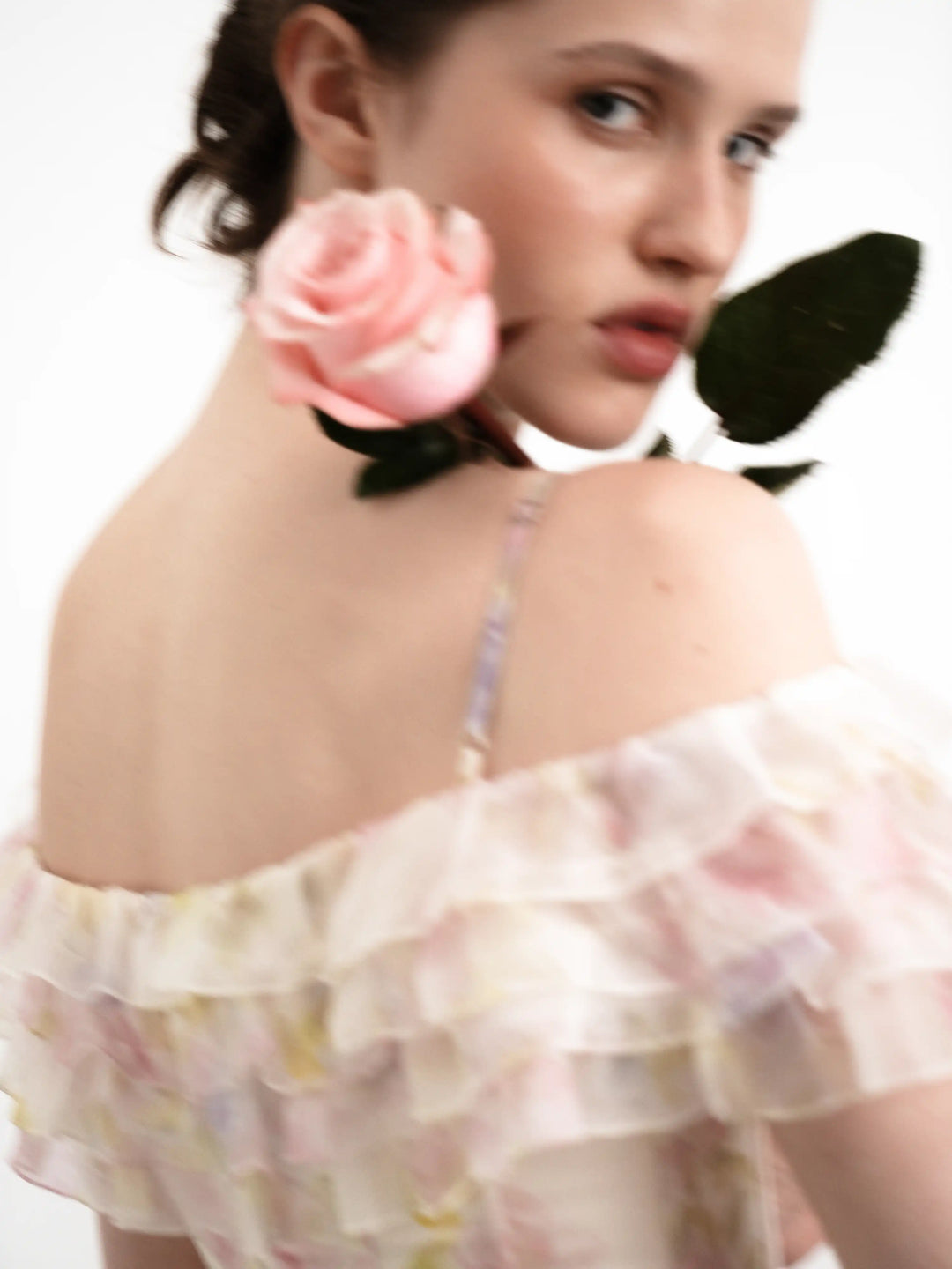 May mini, milky organza mini dress with floral print, ruffles, and a rose