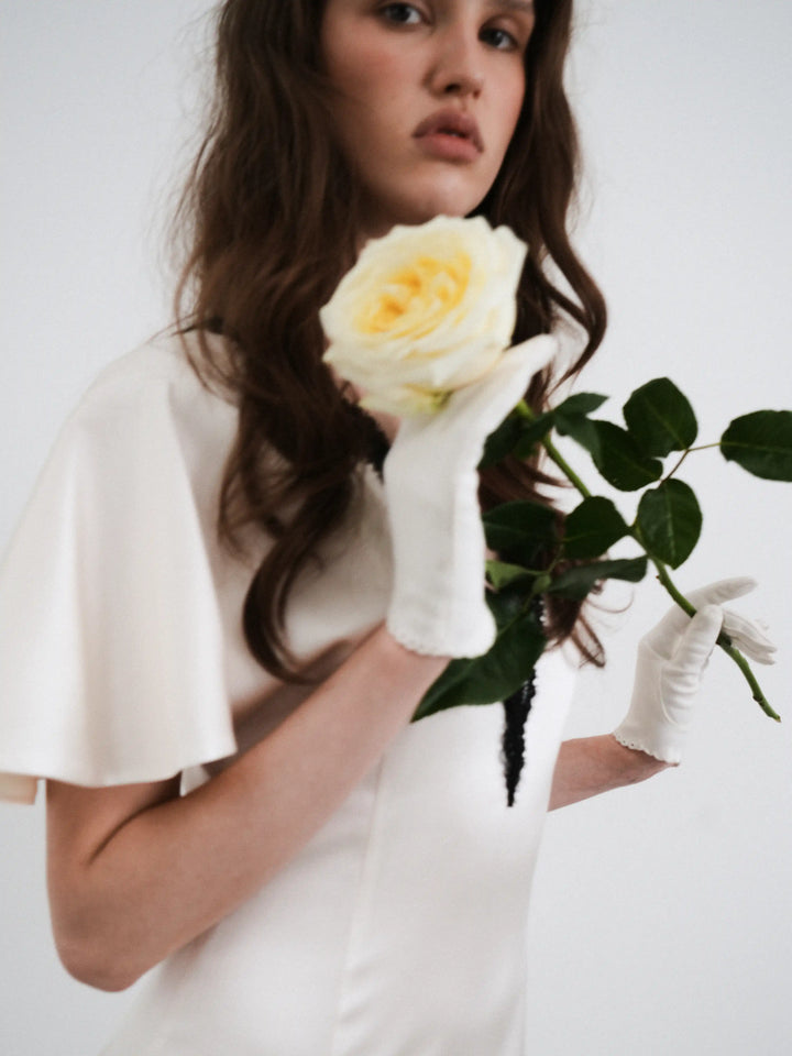 Odette midi, milky satin midi dress with black lace trim